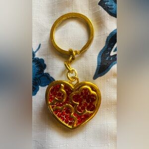 Gold-tone Heart w Flower Filigee Design w Multiple Red Crystals inside Heart